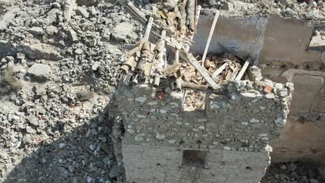 dramatic aerial view of a house and a village destroyed and abandoned during the spanish civil war 1936-39