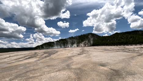 summer tourists visiting famous attractions (grand prismatic spring) in yellowstone national park, wyoming, usa. 4k tourist pov