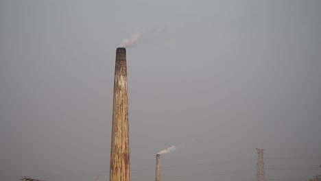 industrial chimneys with smoke