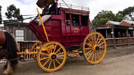 horse-drawn carriage passing through historic town