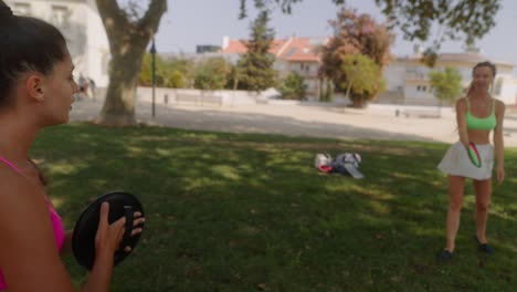 women playing in the park