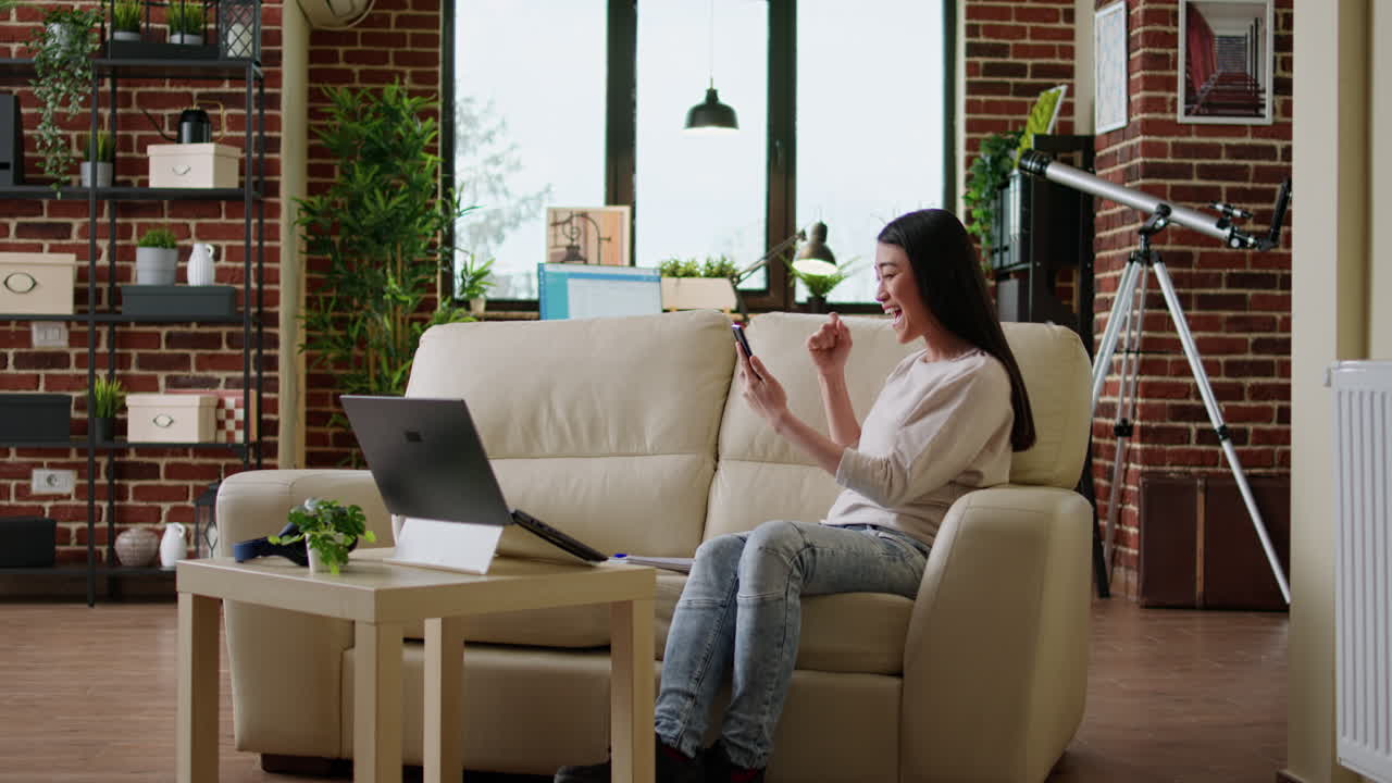 Woman celebrating at home