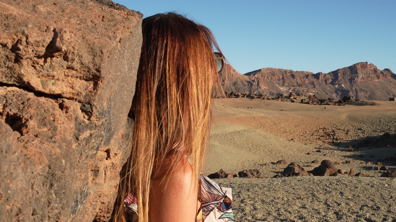Tourist admiring the landscape of Teide National Park