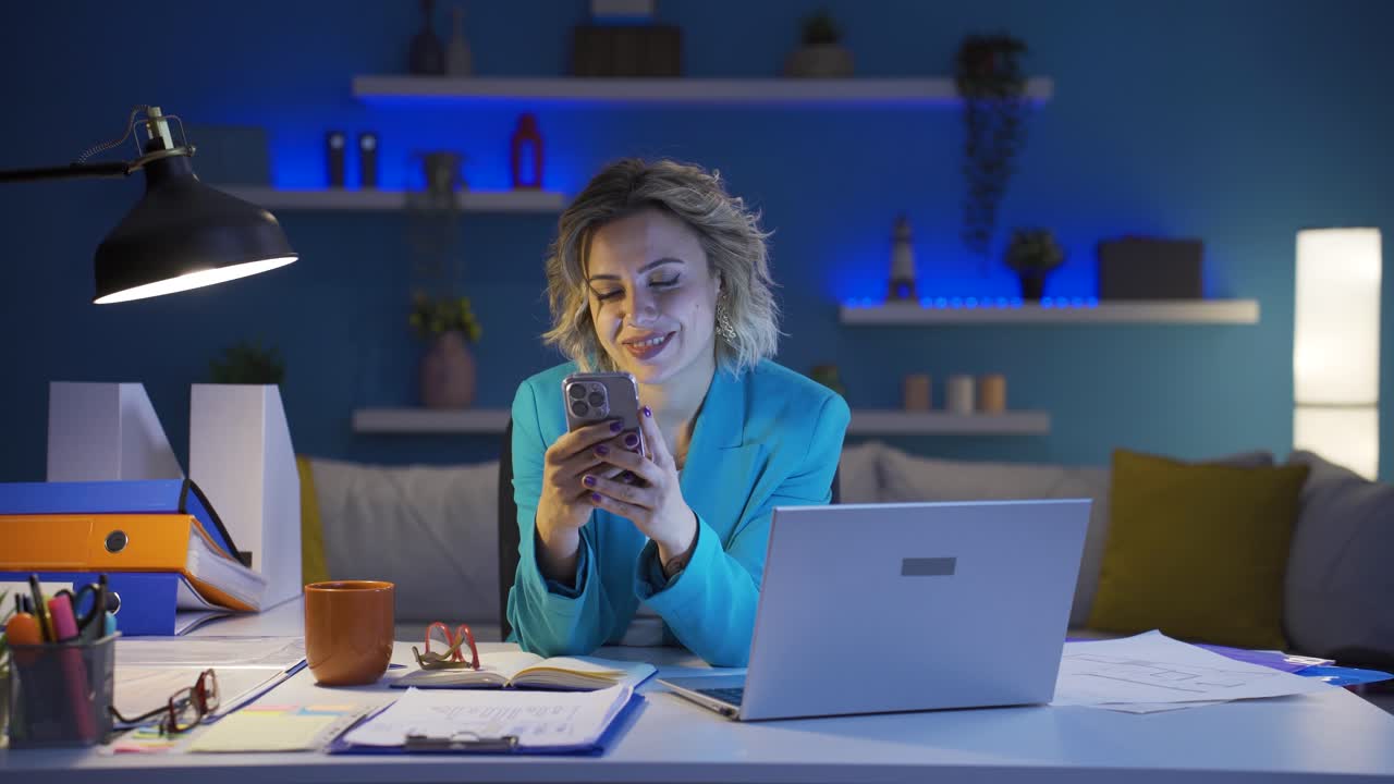 Home office worker woman texting.