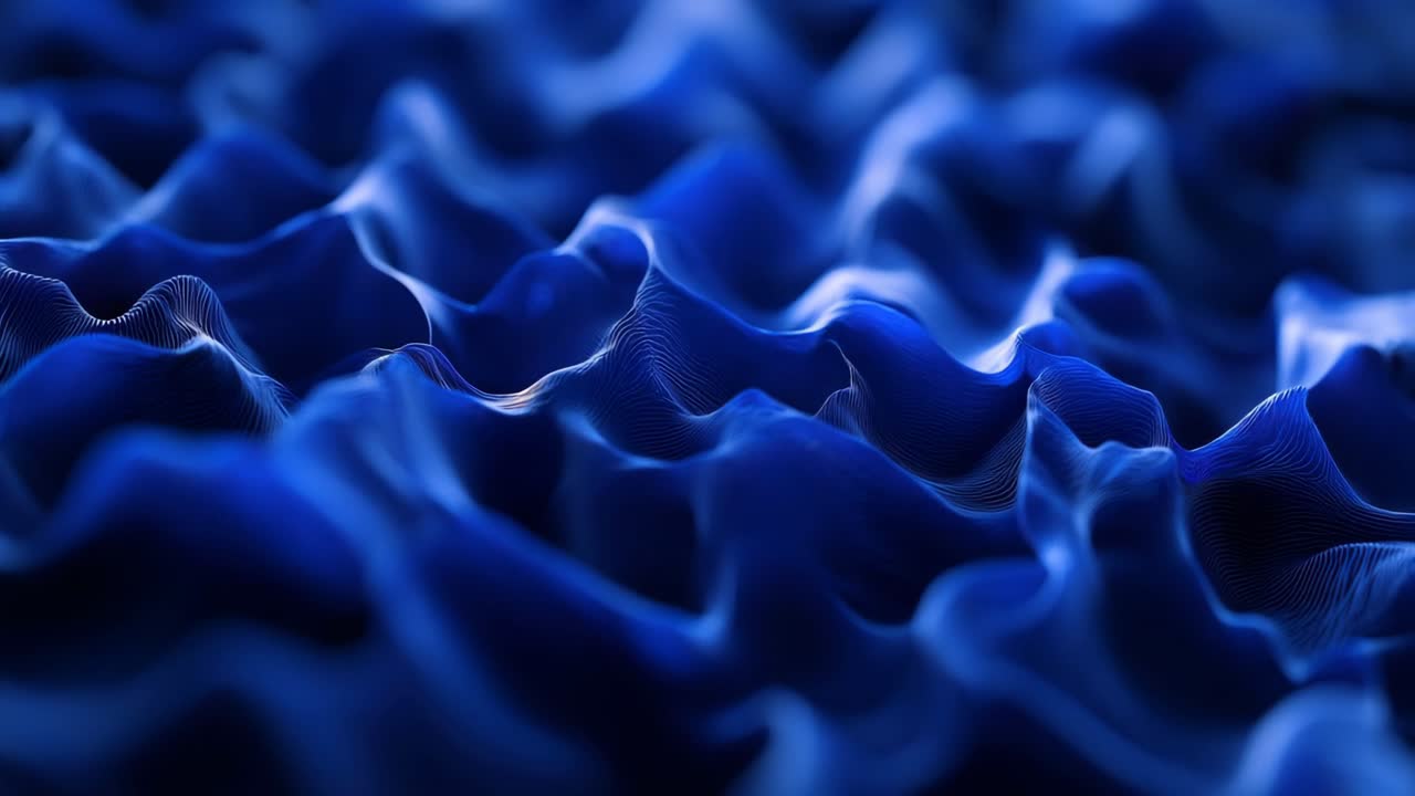 Abstract blue waves with a close-up angle create a dynamic, flowing texture
