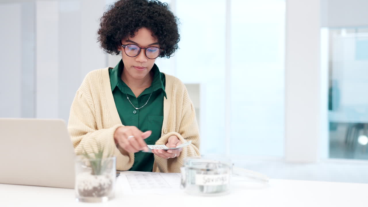 Woman, savings and planning budget with cash