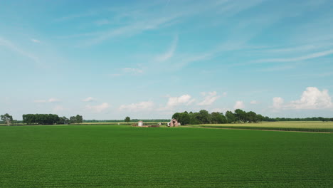 aerial view over farmlands in biscoe, prairie county, arkansas, united states - drone shot