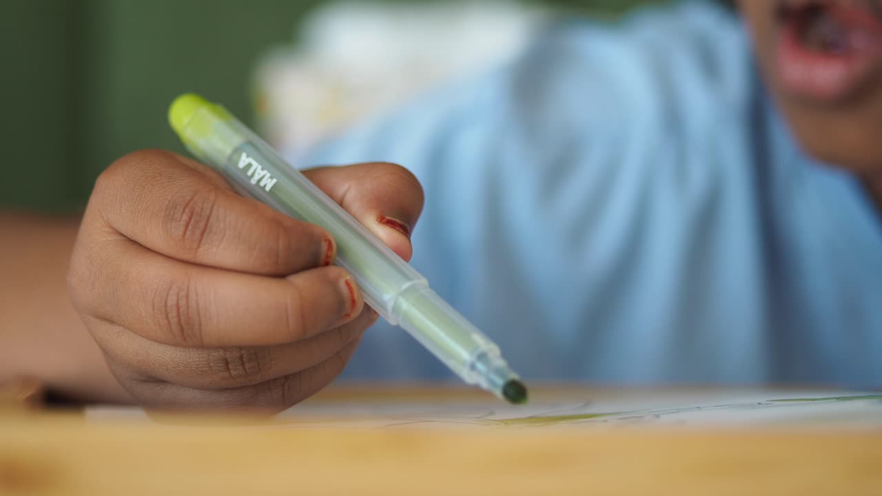 Child Coloring with Marker