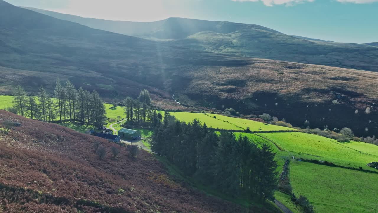 Epic Ireland landscapes drone flying to Mountain Farm Comeragh Mountains In winter