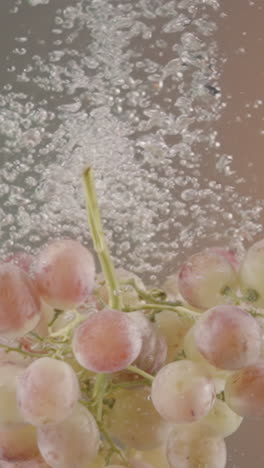 grapes splashing in water