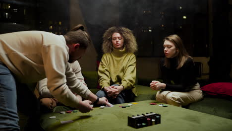 Group-Of-Friends-Sitting-On-The-Couch-In-The-Living-Room-1