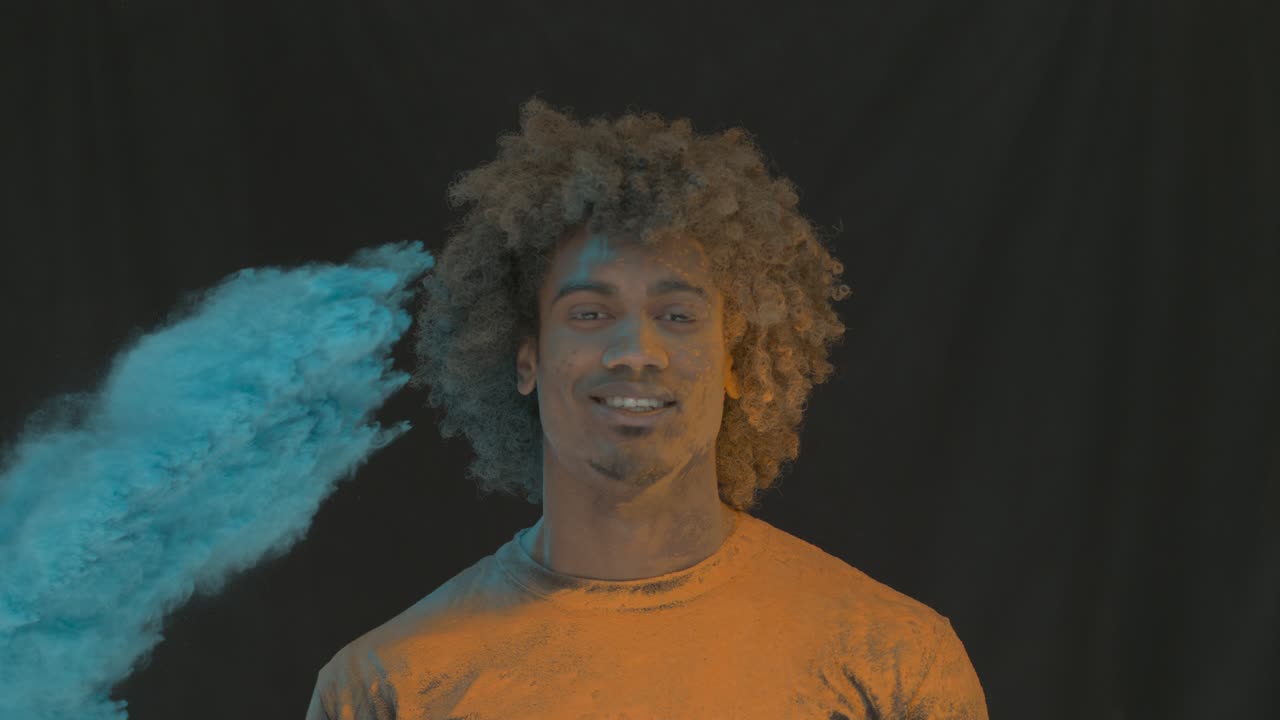 Man in Color Powder Explosion Slow Motion