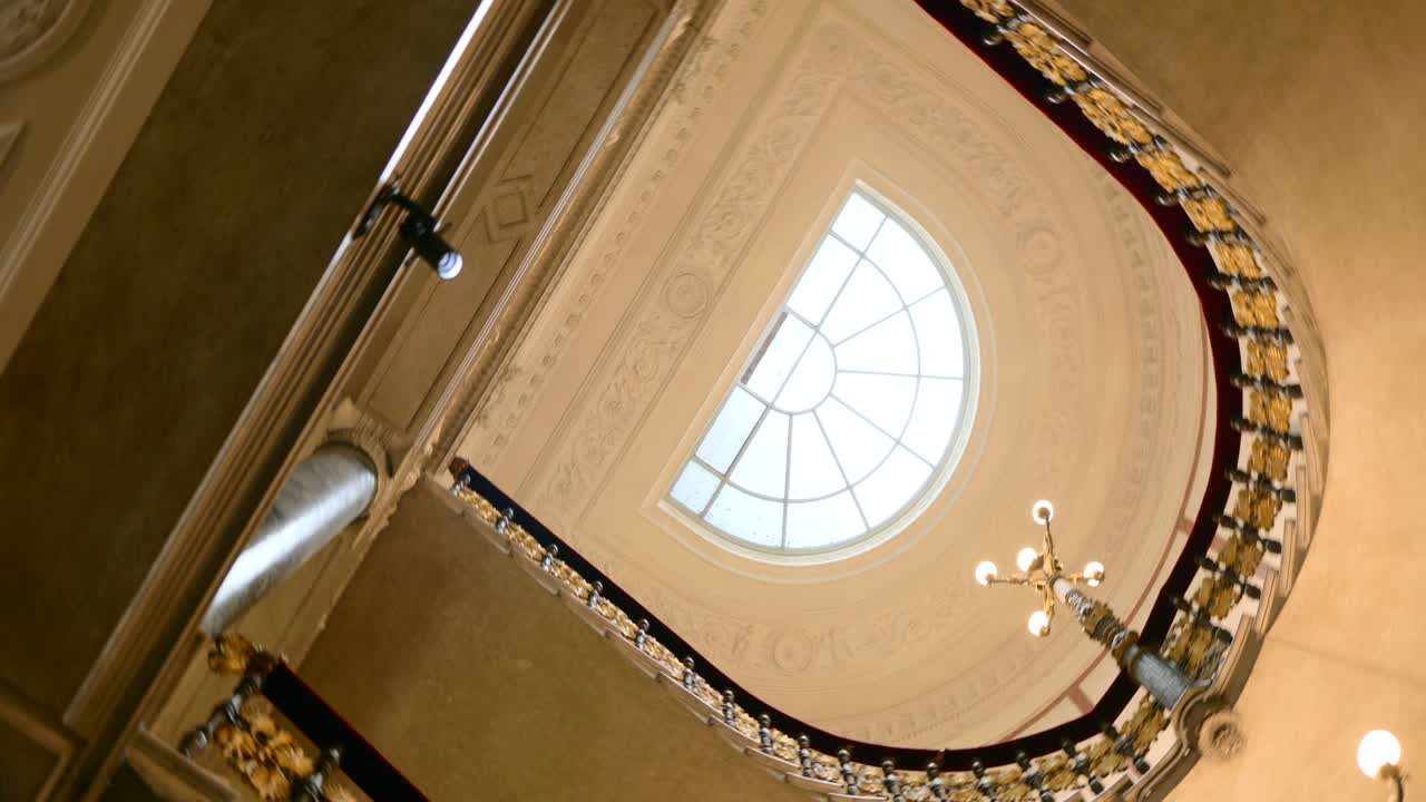 Interior View Of The Staircases At Revoltella Museum In Trieste, Italy. Low Angle Rotating Shot