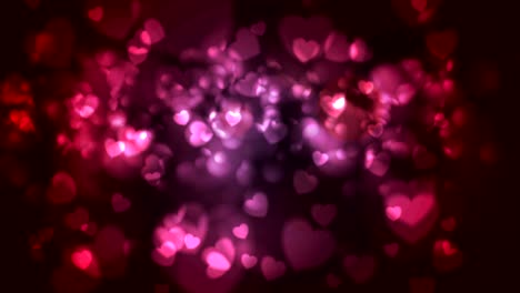 animación de video de corazones bokeh rojos y rosados brillantes