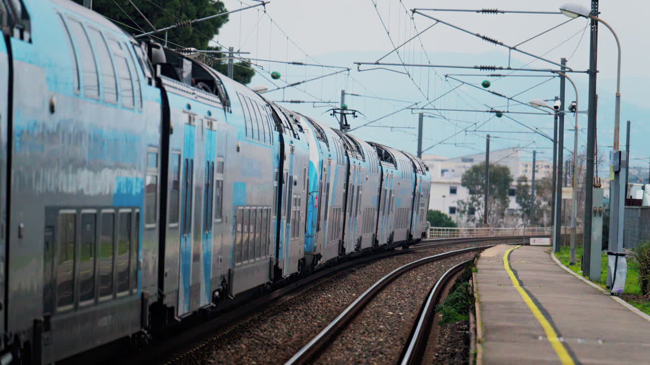 Nice, France - February 4, 2025: Trains moving on the rails in the Nice Ville Central train station