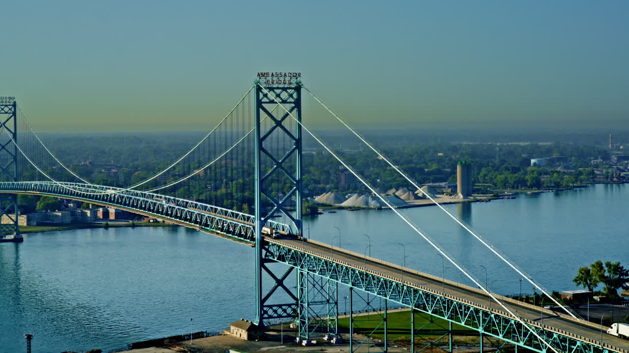 cinematic drone shot of ambassador bridge that connects USA and Canada