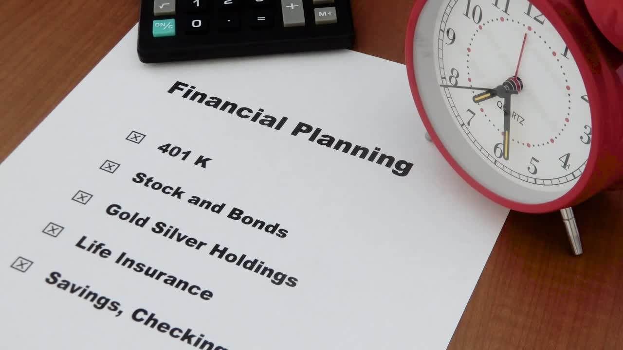 Calculator and clock symbolize the importance of setting up a financial portfolio before it is too late 