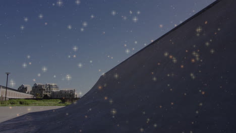 skateboarder performing trick on concrete ramp, with glowing star sparkles highlighting technology