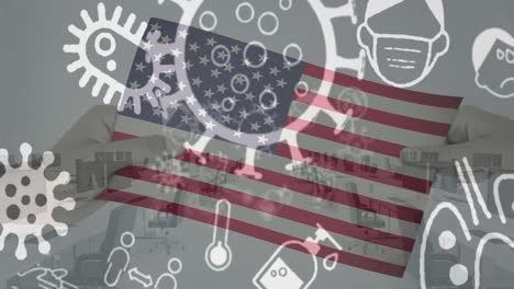 animation of virus cells and covid icons over hands holding flag of usa