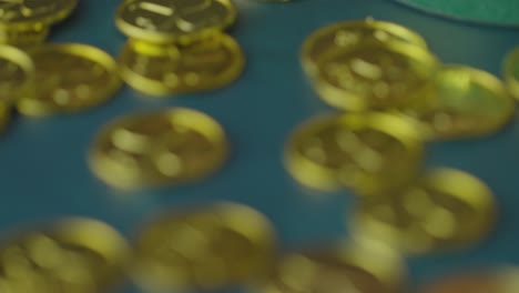 studio shot of green leprechaun top hat and piles of gold coins to celebrate st patricks day 8