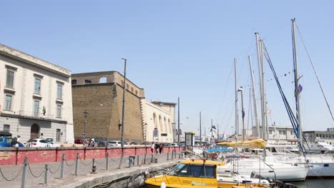 yachts docked at a harbor in naples, italy