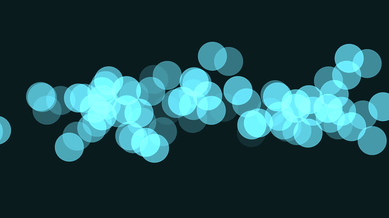 A striking image featuring purple dots arranged in a circular pattern against a black backdrop, creating a mesmerizing and floating illusion