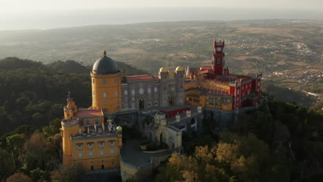 Close-Up-Aerial-Shot-of-the-Pena-Palace,-National-Park-of-Sintra,-Portugal