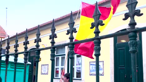 at the heart of lisbon, a spanish flag proudly flutters atop hands, symbolizing unity and cross-cultural connections between nations - jornadas mundiais da juventude