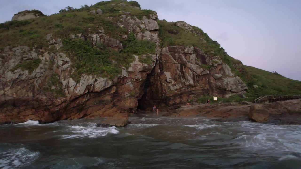 Gruta das Encantadas, Aerial view of the cave at sunrise and beaches of Ilha do Mel, Paraná, Paranaguá,