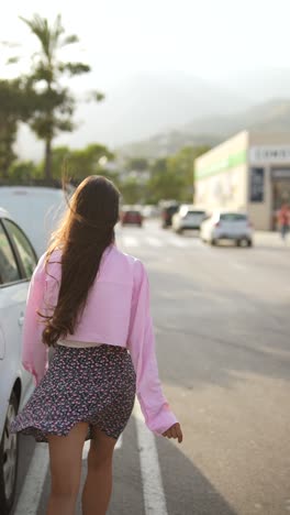 woman walking in a city street