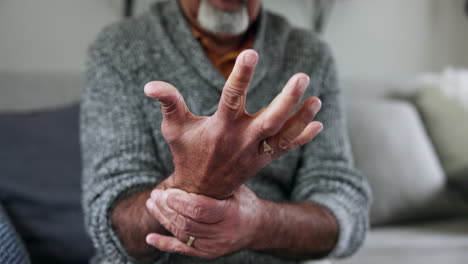 senior man, wrist and arthritis in closeup