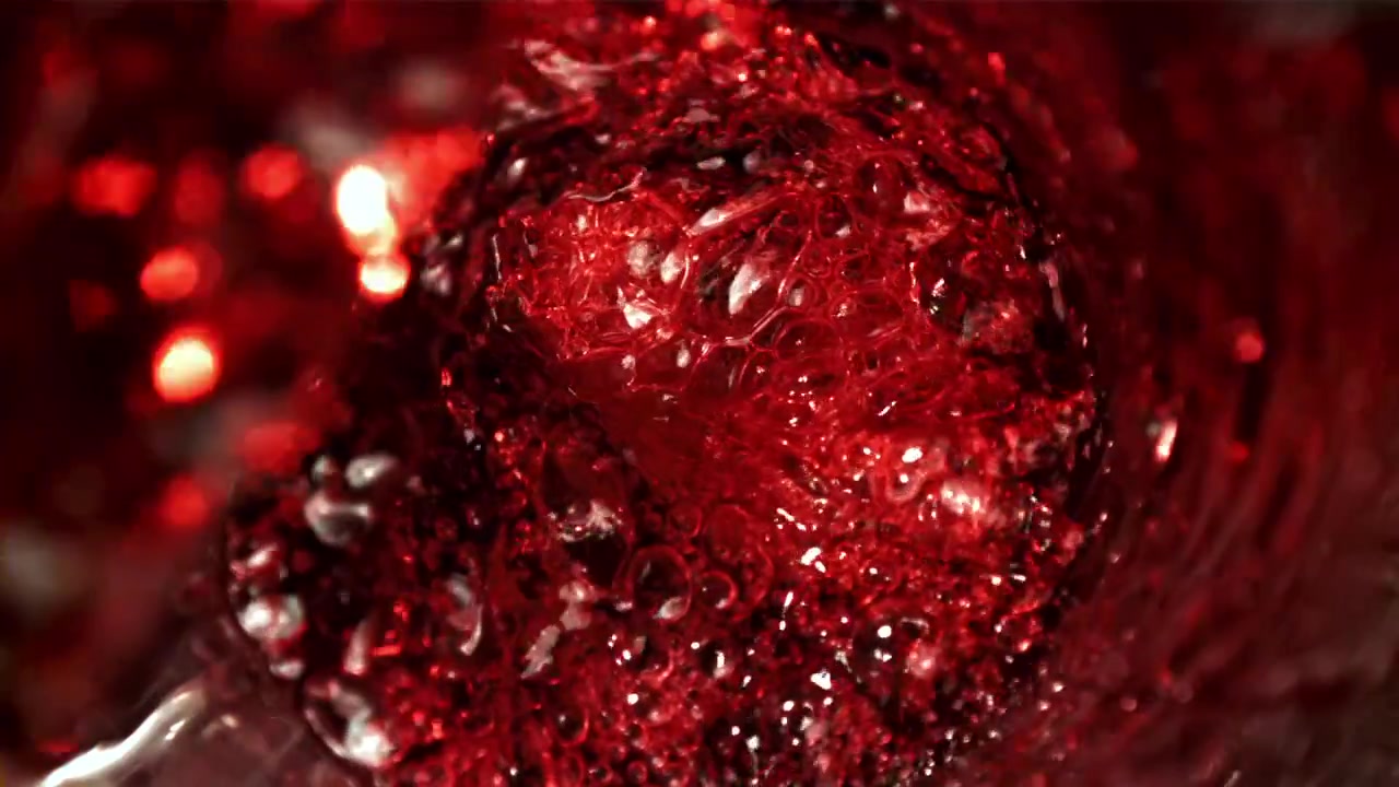 Vibrant Red Liquid Swirling in Slow Motion
