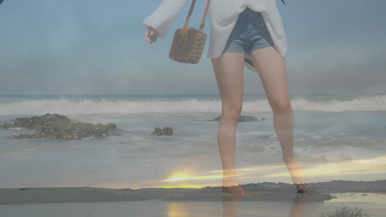 백인 여성이 해변에서 바다를  ⁇ 고 풍경을 조망하는 애니메이션