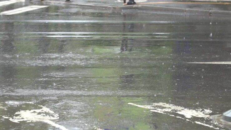 Car Tyres Driving Over Deep Pond And Splashing Water In Slow Motion