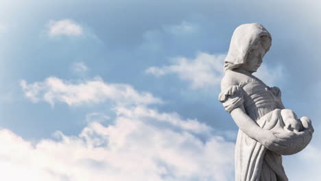 animation of gray sculpture of woman over blue sky and clouds, copy space