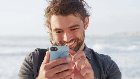 Man,-phone-and-beach-holiday-while-online