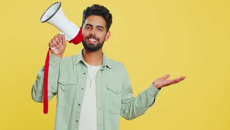 Indian-man-talking-with-megaphone,-proclaiming-news,-loudly-announcing-advertisement-discounts-sale