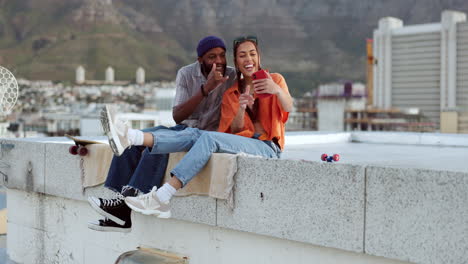 Selfie,-rooftop-and-couple-with-skateboard