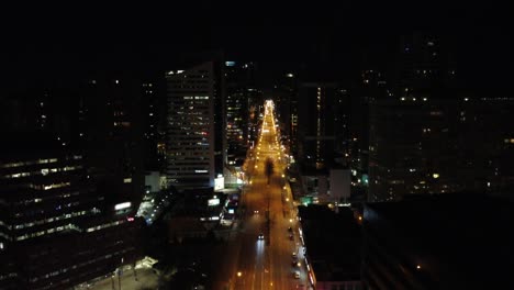 downtown toronto canada empty road illuminated by lights, drone rising dolly