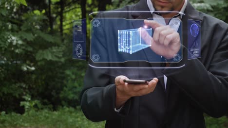 businessman uses hologram with cargo container