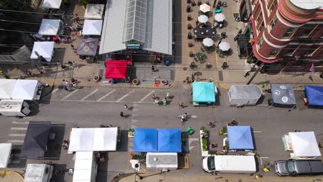 aerial view of a busy farmers market in a city