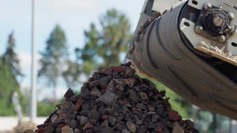 Stones falling from the belt conveyor on a pile