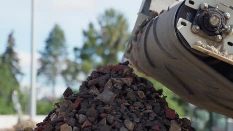 stones falling from the belt conveyor on a pile