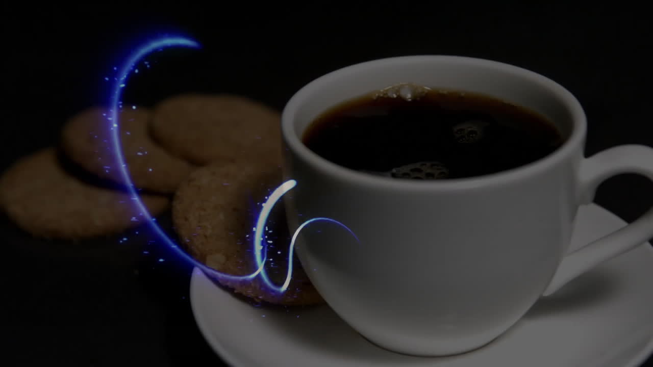 White coffee cup floating on dark tabletop with neon blue light swirling above oatmeal cookies