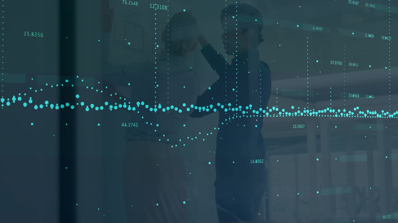 Collaborating with data visualization overlay, business professionals working in office