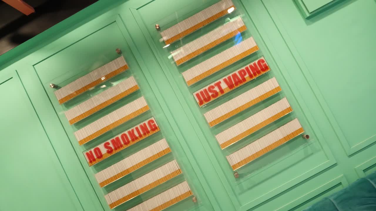 Wall Display With No Smoking Just Vaping Signage