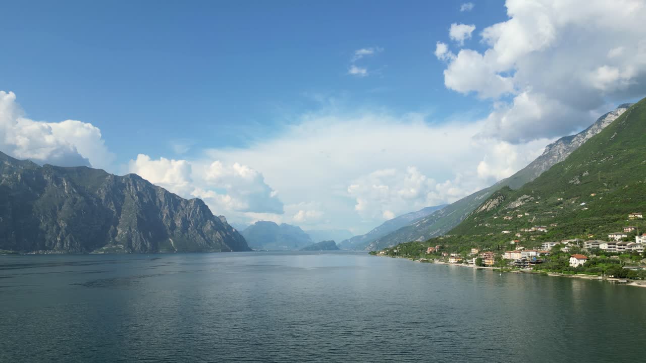 Mountain Background And Lake Garda Near Malcesine In The Province Of Verona, Italy. Wide Shot