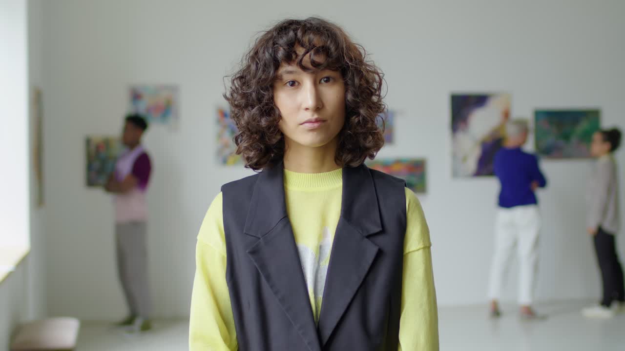 Portrait of Young Female Visitor in Art Gallery