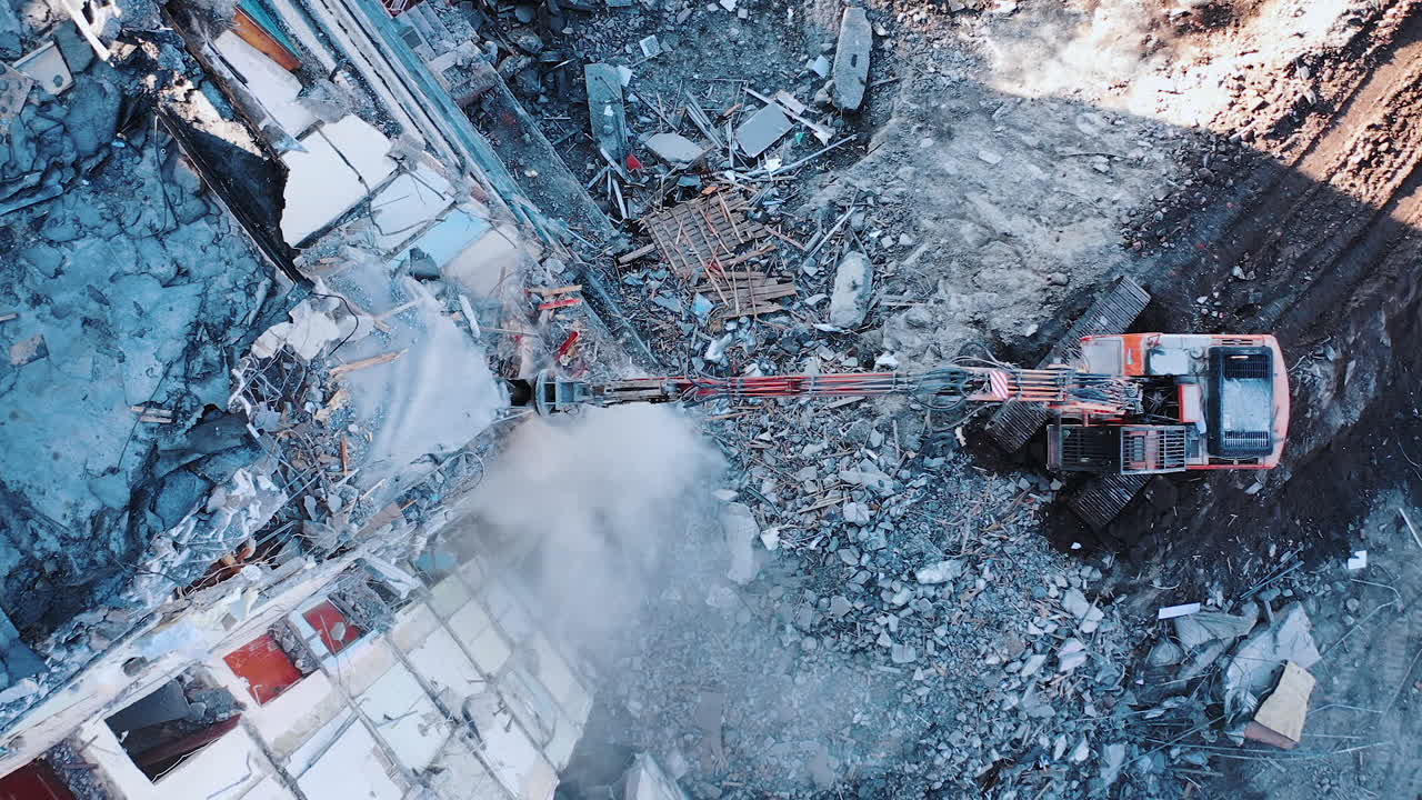Natural disaster demolition building. Earthquake house destroyed aerial view.