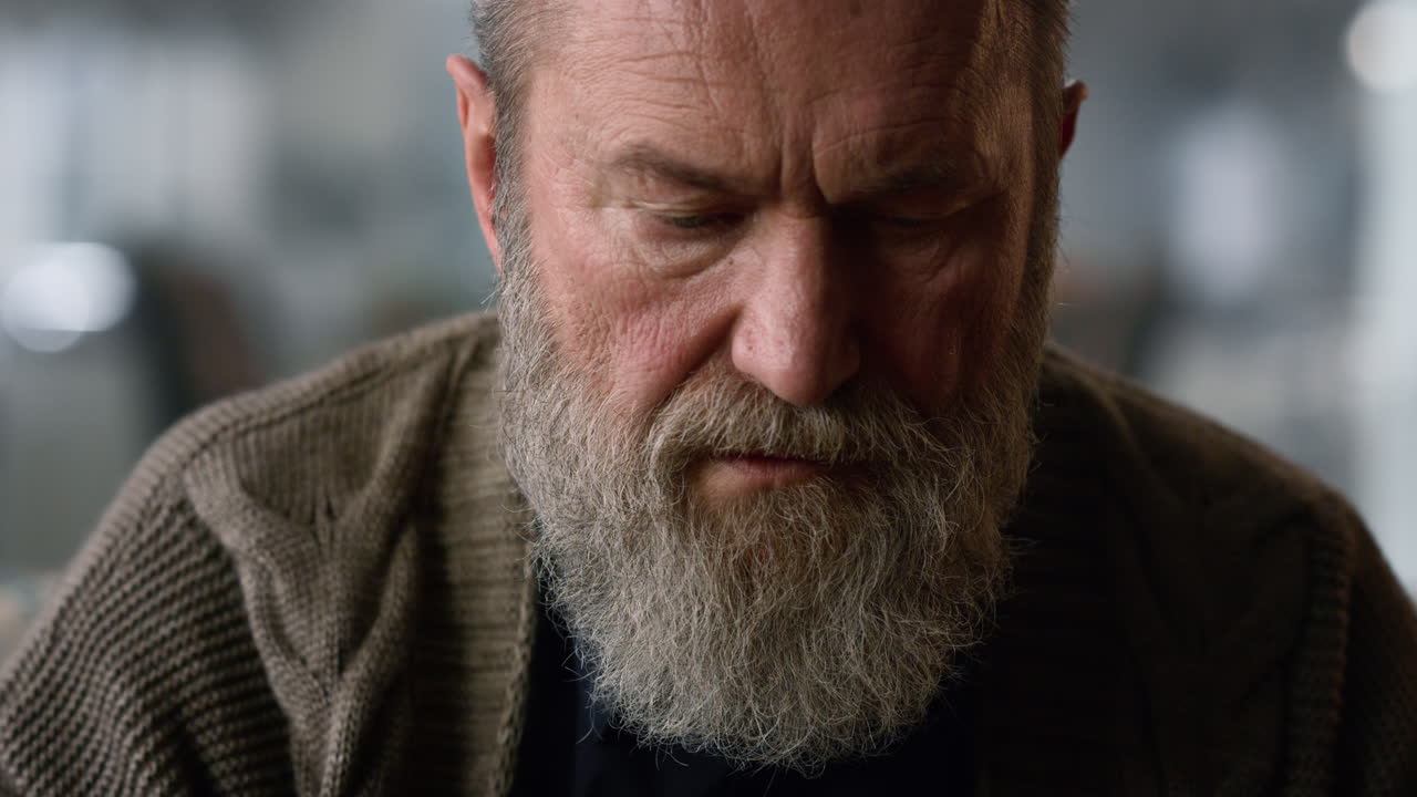 Portrait serious mature man face. Closeup thoughtful old gentleman thinking
